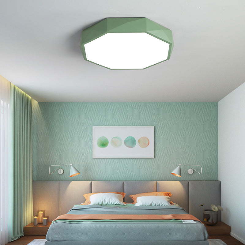 Green octagonal ceiling light in a bedroom with mint green wall, grey headboard and bedside wall lamps 20