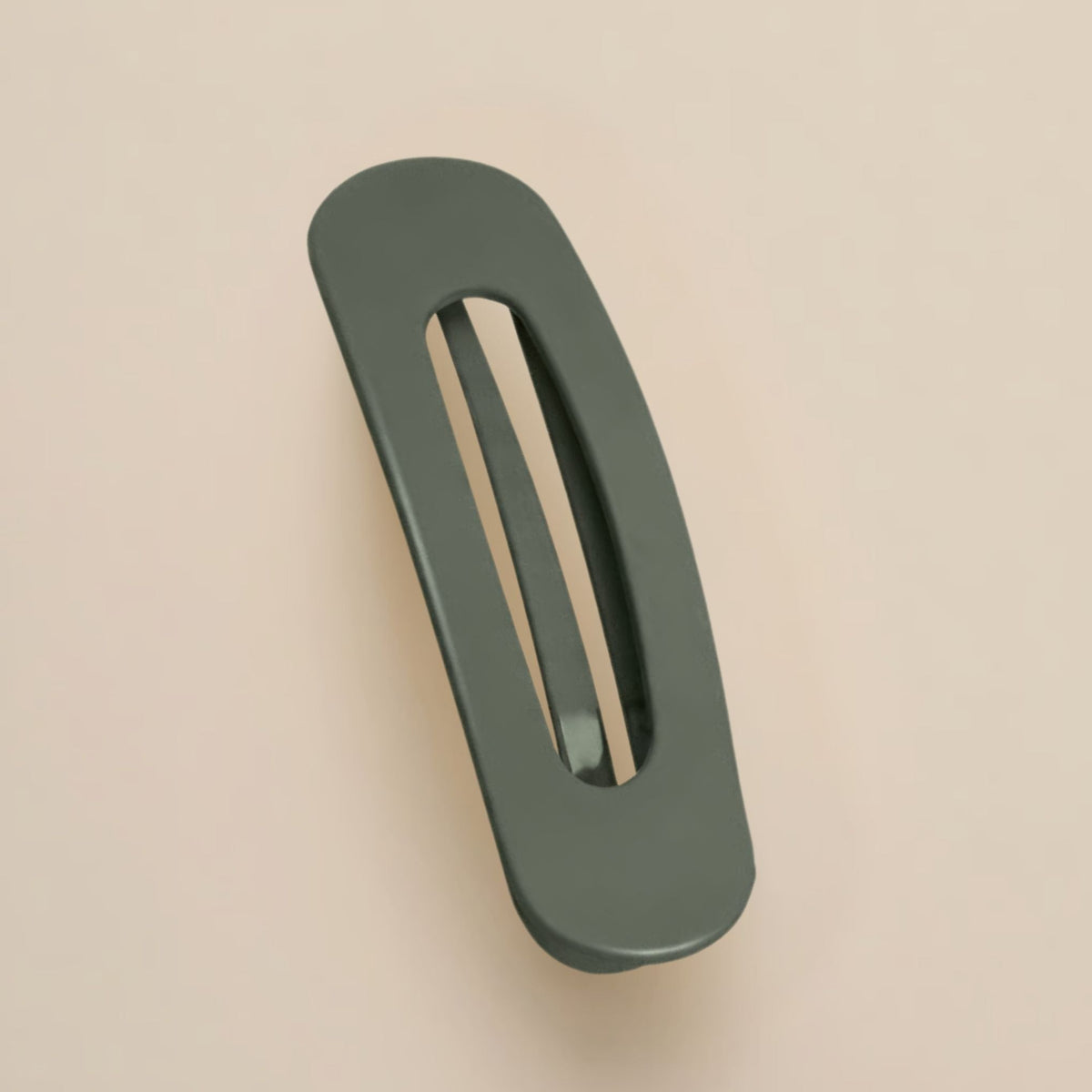 Matte dark olive-green slim flat clip with a long open slot on a beige background 16
