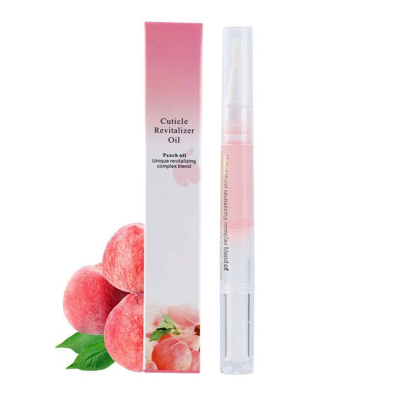 Peach-scented pen with pink box and ripe peaches with leaves beside it 17