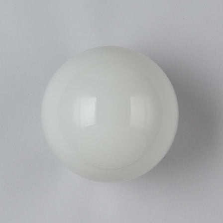 Unlit opal glass sphere seen from the front, smooth and glossy white against a plain grey background 17