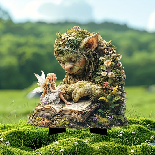Sleepy moss-covered troll resting its hands on an open book, with a small winged fairy sitting on the page, staked in mossy grass. 2