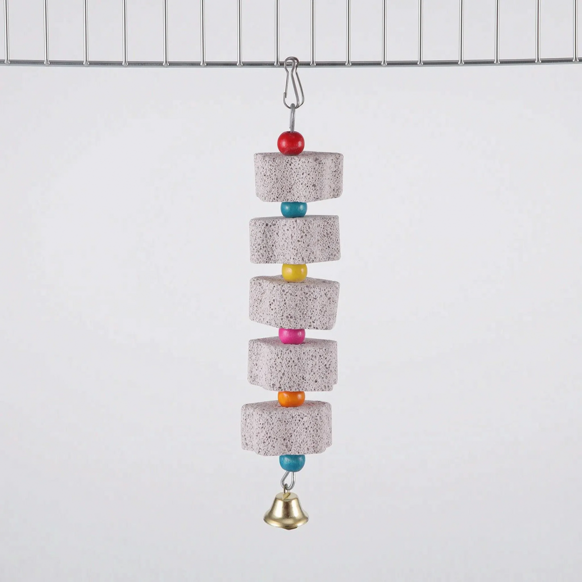 Longest version with five pumice blocks separated by red, turquoise, yellow, pink, orange and turquoise beads, with a brass bell at the bottom. 9