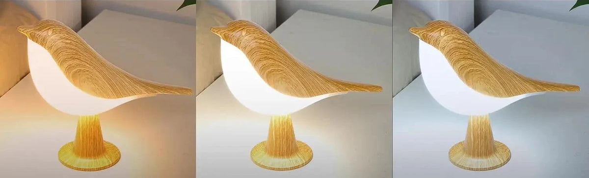 Three side-by-side views of the wood-effect bird lamp showing warm, neutral and cool white light settings 2