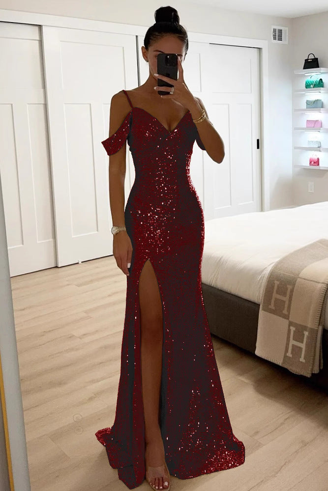 Model in the deep red sequin version, showing the off-shoulder straps and high front slit 5