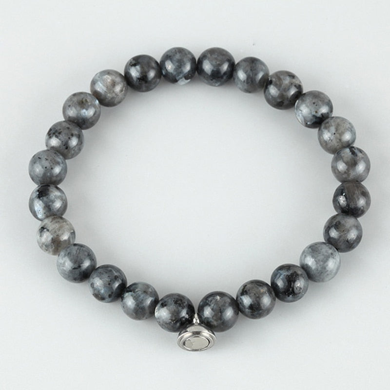 Flat lay of the grey speckled bead bracelet with a small silver magnetic clasp 4
