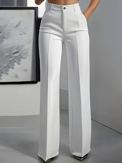 Front view of wide-leg trousers in white with a centre crease, worn with a hand in the pocket 2