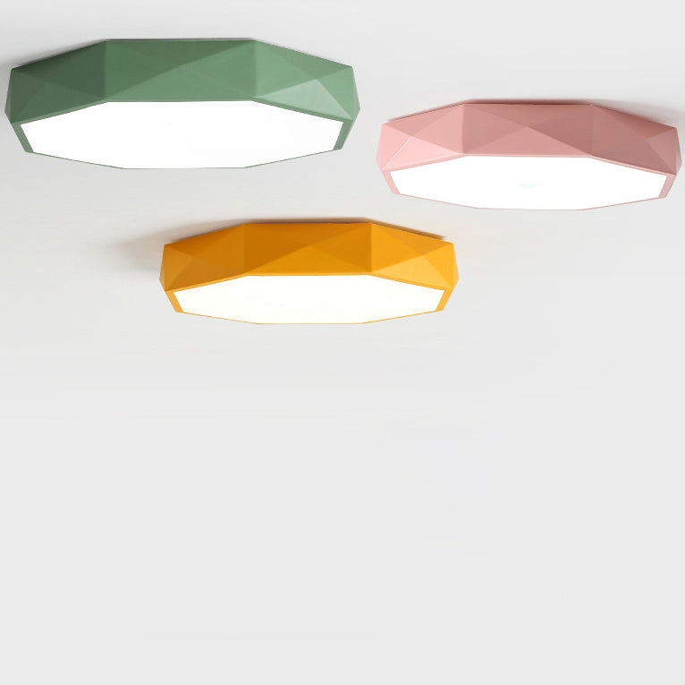 Green, pink and yellow octagonal lights seen from the side, showing the faceted diamond-cut shades 4