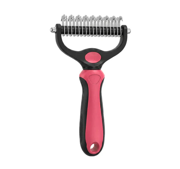 Pink and black rake viewed from the curved-blade side, showing the hooked stainless steel teeth and rounded handle. 13