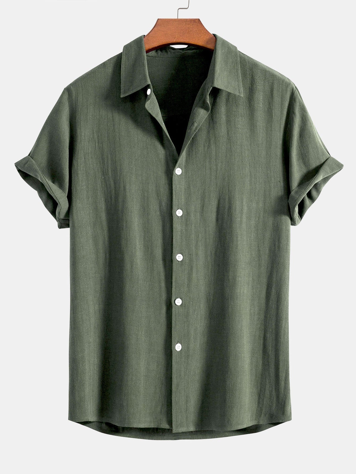 Short sleeve button-up shirt in olive green on a wooden hanger, with a soft collar and white buttons. 5