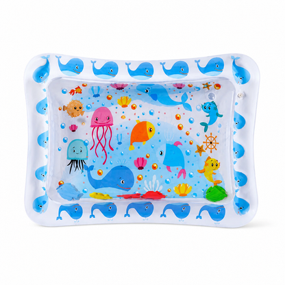 Rectangular water mat with a white border of blue whales and a pale blue centre showing jellyfish, fish and floating sea shapes. 8