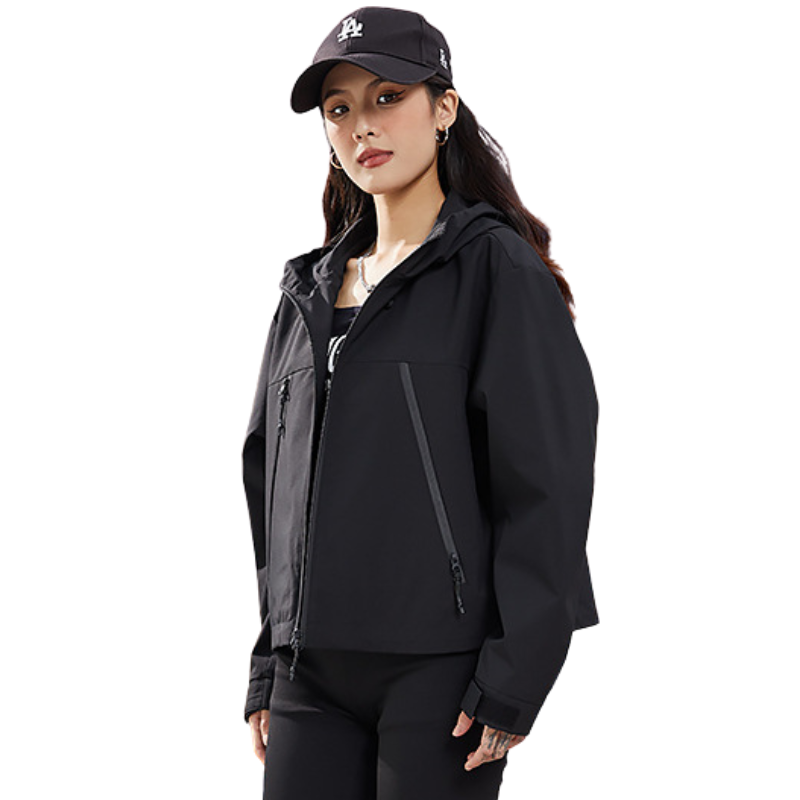 Three-quarter view of the black jacket worn open, showing a diagonal pocket zip and cuff tab 16