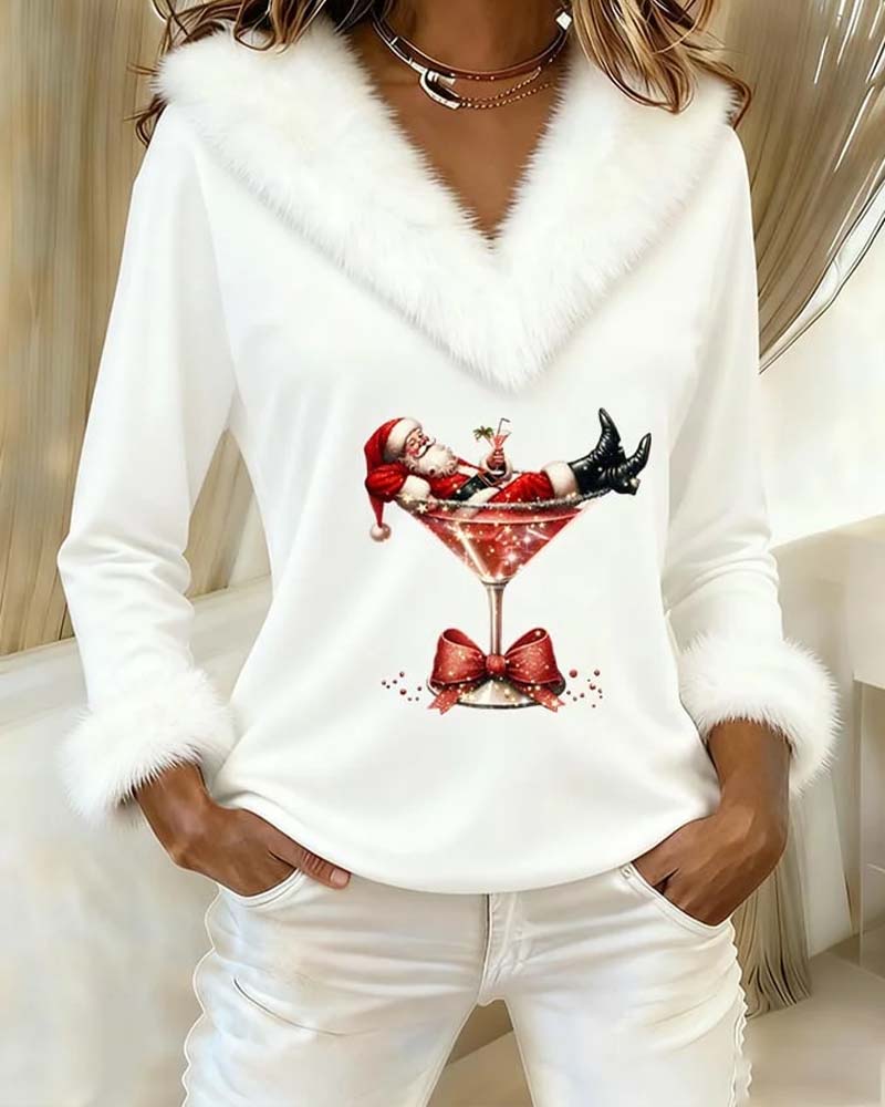 White version with matching faux-fur collar and cuffs, Santa-in-cocktail-glass print, worn with white trousers 2