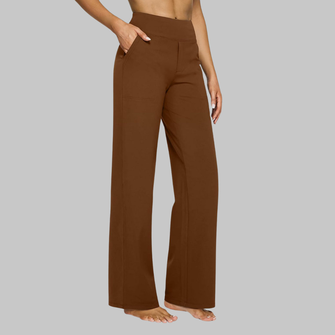 Rich brown version of the high-waist straight-leg trousers, side view showing the patch pocket and wide leg. 13