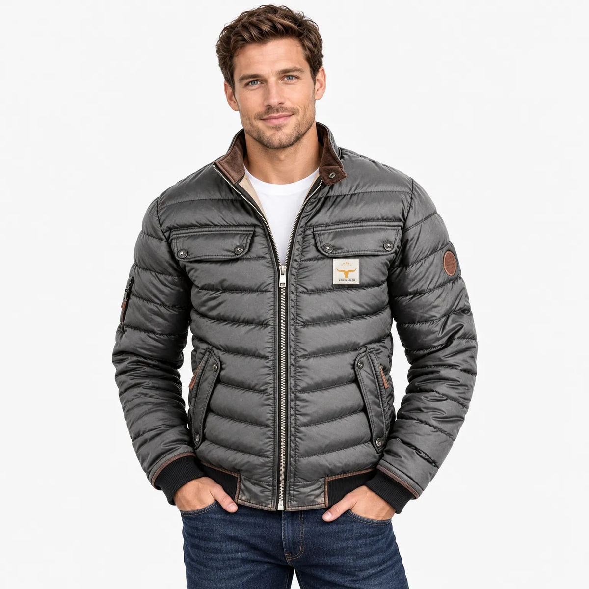 Model wearing the grey quilted jacket zipped up over a white t-shirt, hands in jeans pockets 10
