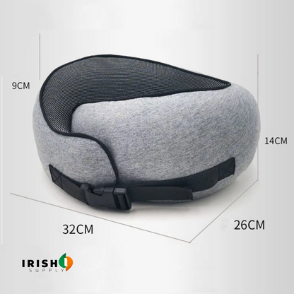 Grey pillow with black buckle strap shown at an angle, with dimension lines marking its height, width and depth. 9