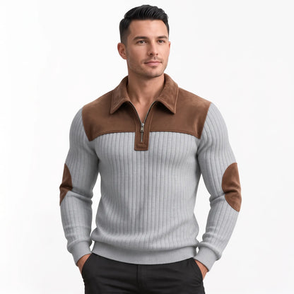 Model wearing the light grey ribbed jumper with brown shoulder panel, looking off to the side 11