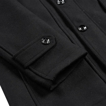 Close-up of a black coat cuff strap with a glossy button, and the front buttons beside it 11