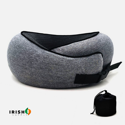 Grey pillow with black mesh lining and fastened black buckle strap, shown with its small black drawstring pouch. 10