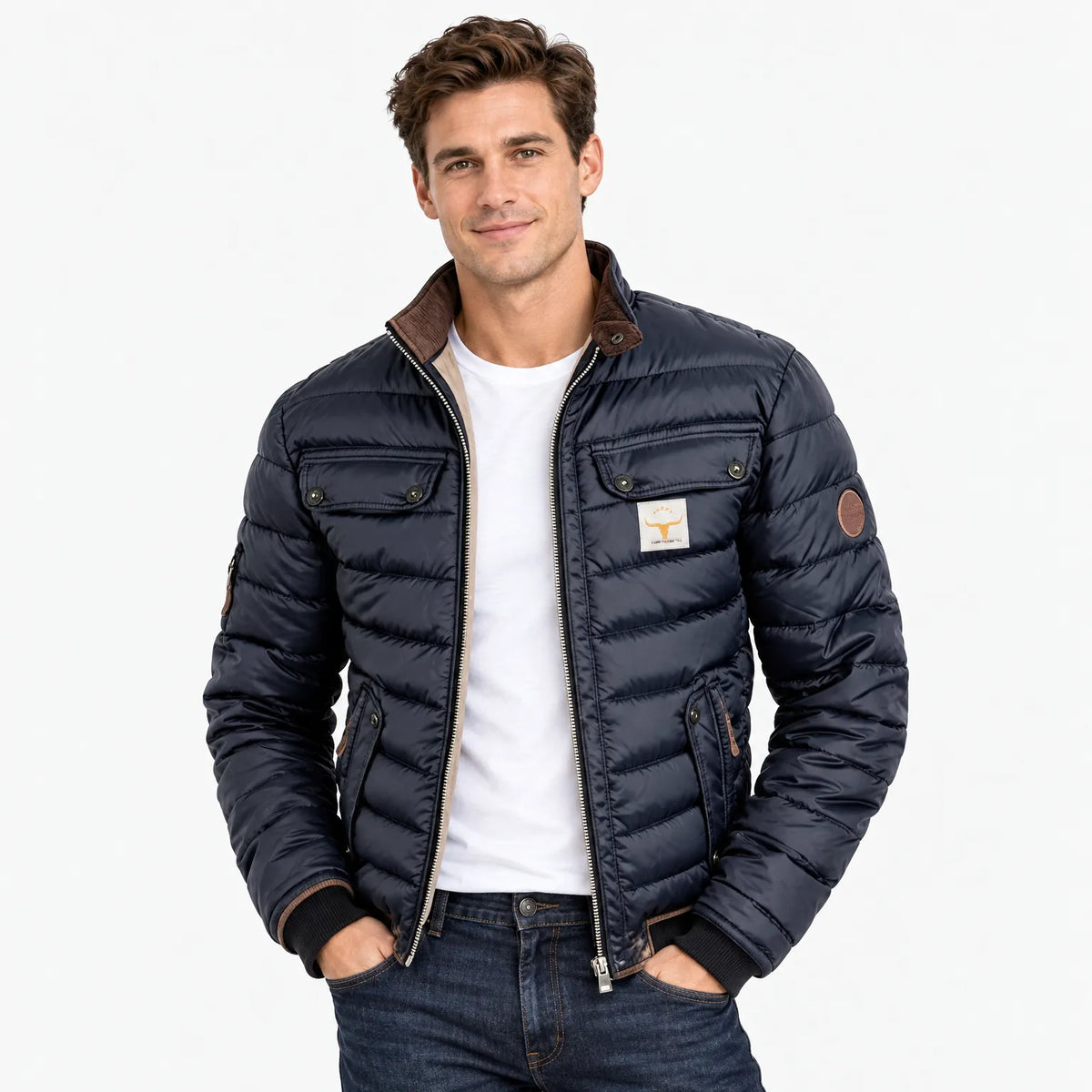 Model wearing the navy quilted jacket open over a white t-shirt and dark jeans, hands in pockets 11