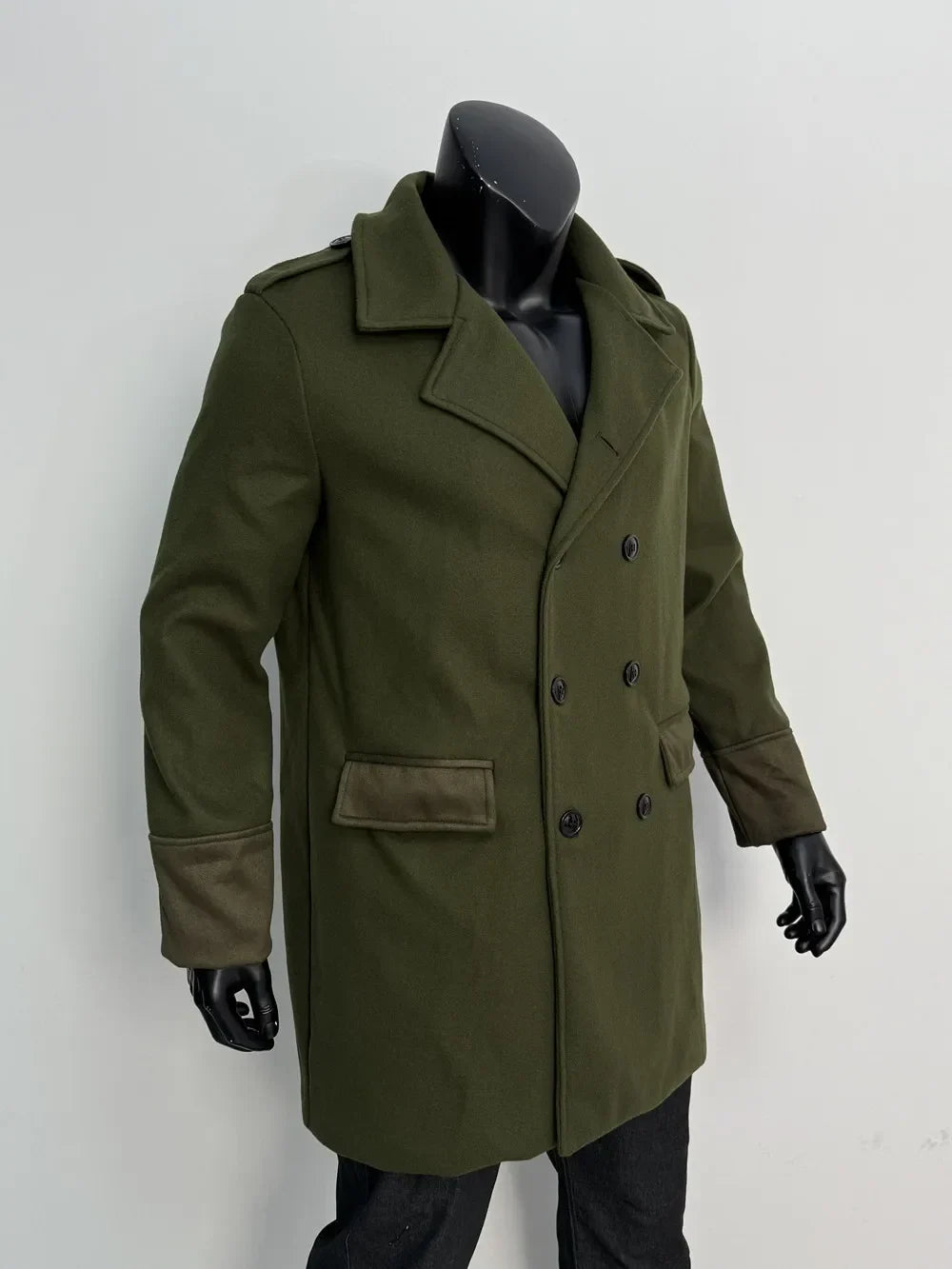 Olive green overcoat on a mannequin, angled three-quarter view showing the lapels, buttons and cuff detail 12