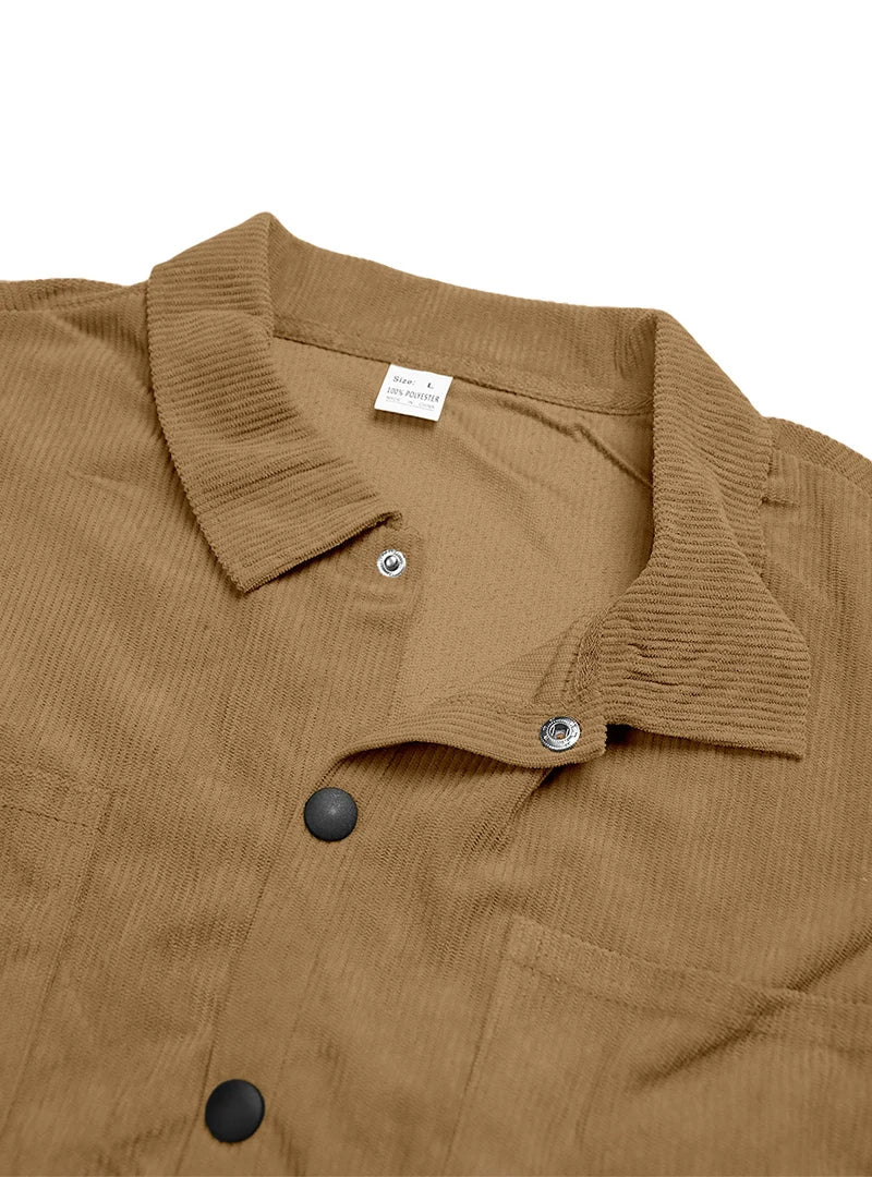 Flat view of the tan shirt's collar and inner neck label with metal snap fastening 13