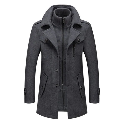 Grey overcoat shown from the front, with zipped knitted inner collar and angled flap pockets 13