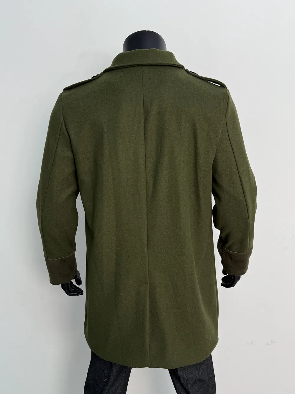 Back view of the olive green overcoat on a mannequin, showing the centre seam and brown cuffs 13