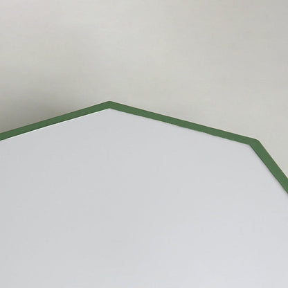Close-up of one corner of the green light, showing the thin green rim around the white diffuser 19