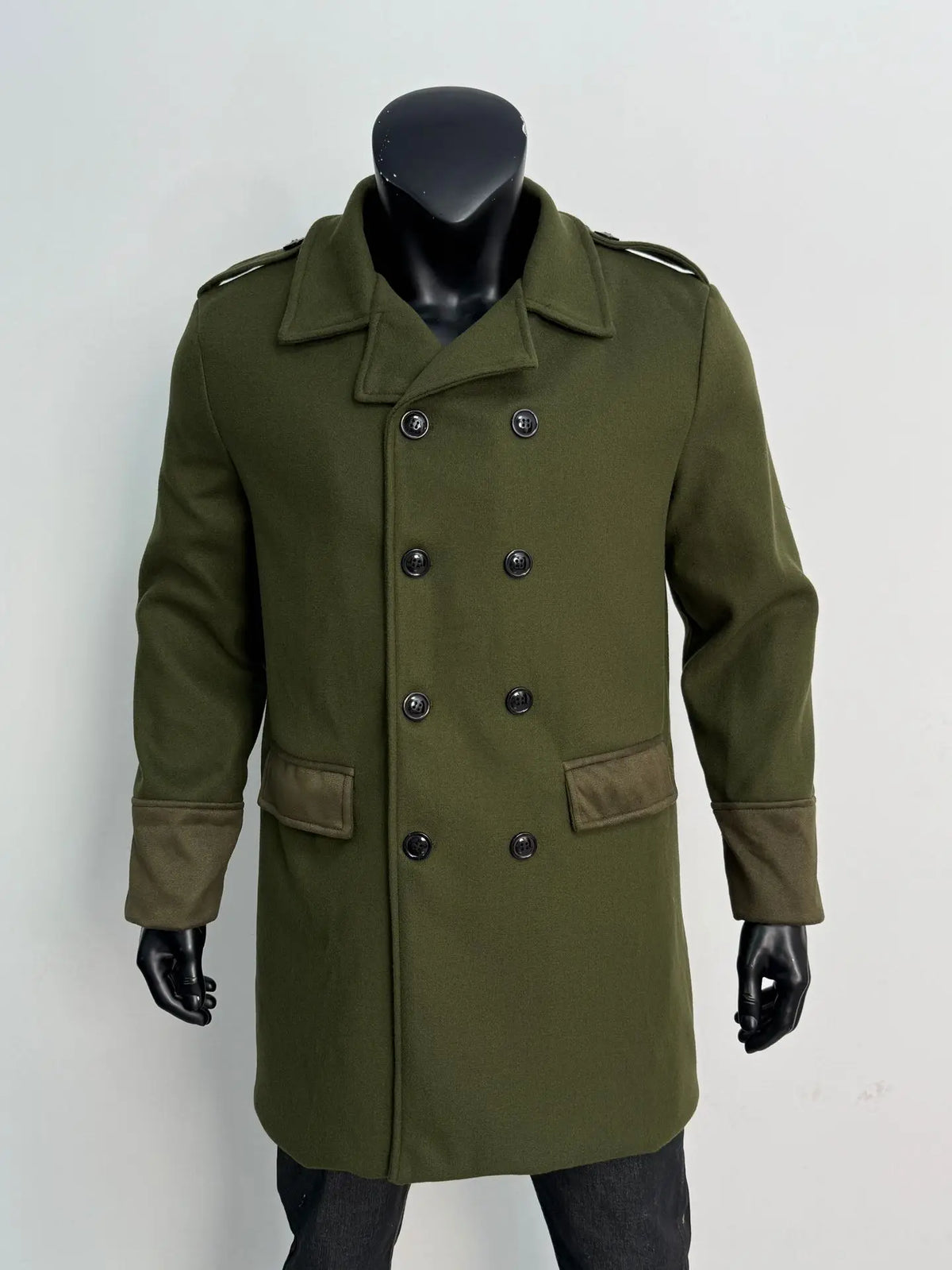 Olive green overcoat on a mannequin, close front view showing eight black buttons and shoulder epaulettes 14