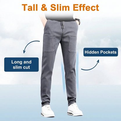 Grey trousers on a model with callouts pointing to the long, slim cut and the hidden pockets 19