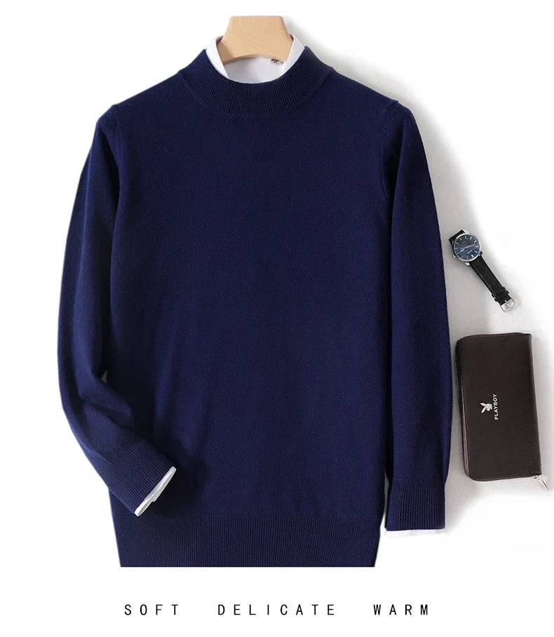 Navy mock neck jumper on a hanger with white shirt collar, watch and brown wallet 15
