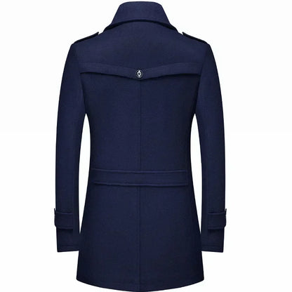 Back of the navy coat, showing the buttoned yoke, shoulder epaulettes and belted waist panel 15