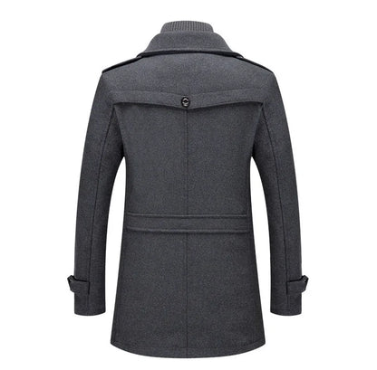 Back view of the grey overcoat, with the buttoned yoke flap, waist strap and shoulder epaulettes 15