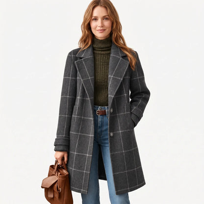 Model with long auburn hair wears the charcoal checked coat open, holding a brown leather bag, on white 15