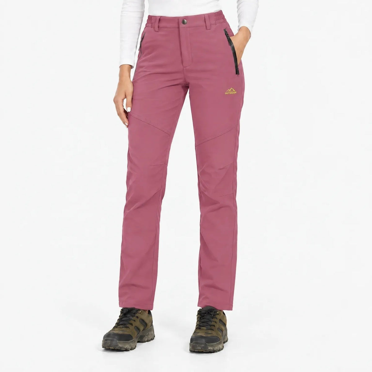 Dusky rose pink trousers worn by a model, front view with elasticated waist and zip pockets 17
