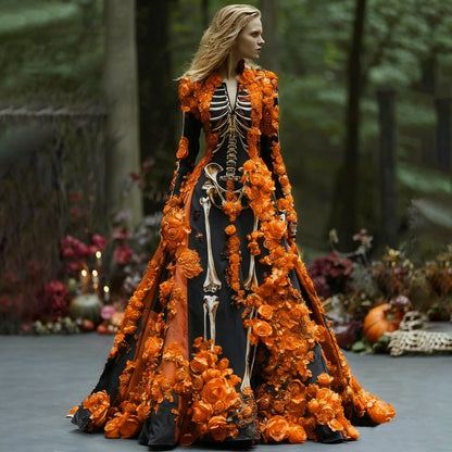 Model in the black skeleton-print maxi dress with orange three-dimensional roses, standing in a woodland setting with pumpkins and candles. 1