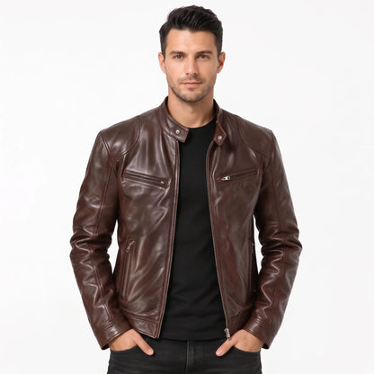 Model in a rich brown leather biker jacket over a black t-shirt, hands in pockets 16