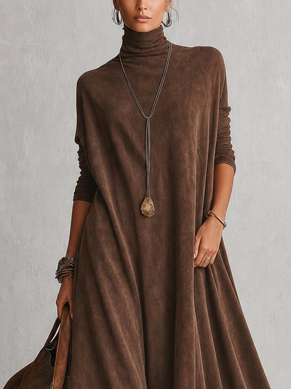 Close-up of the brown high-neck bodice and long sleeves, worn with a pendant necklace 7