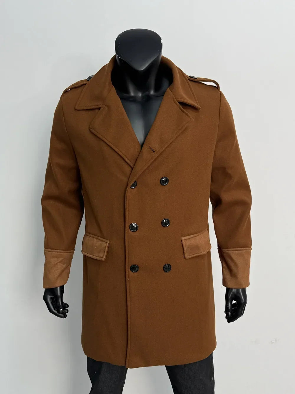 Tan brown double-breasted overcoat on a mannequin, front view with black buttons and contrast cuffs 17