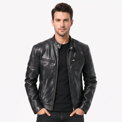 Model in a black leather biker jacket over a black t-shirt, hands in pockets 17
