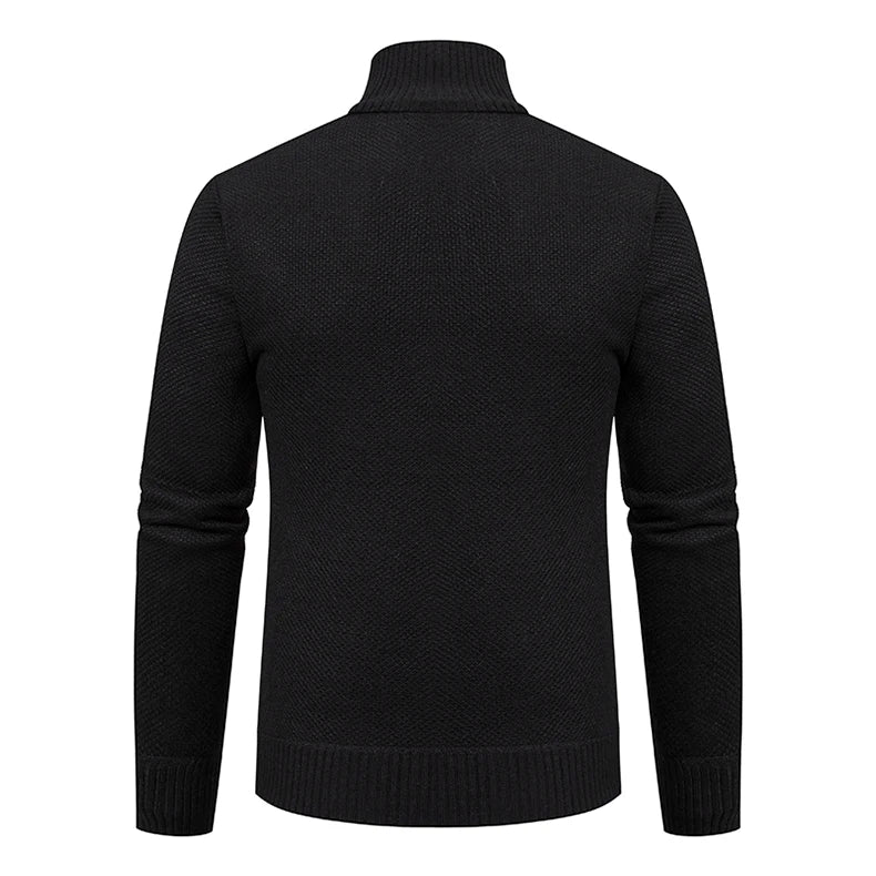 Back view of the black knitted cardigan, showing the plain textured knit and ribbed collar 17