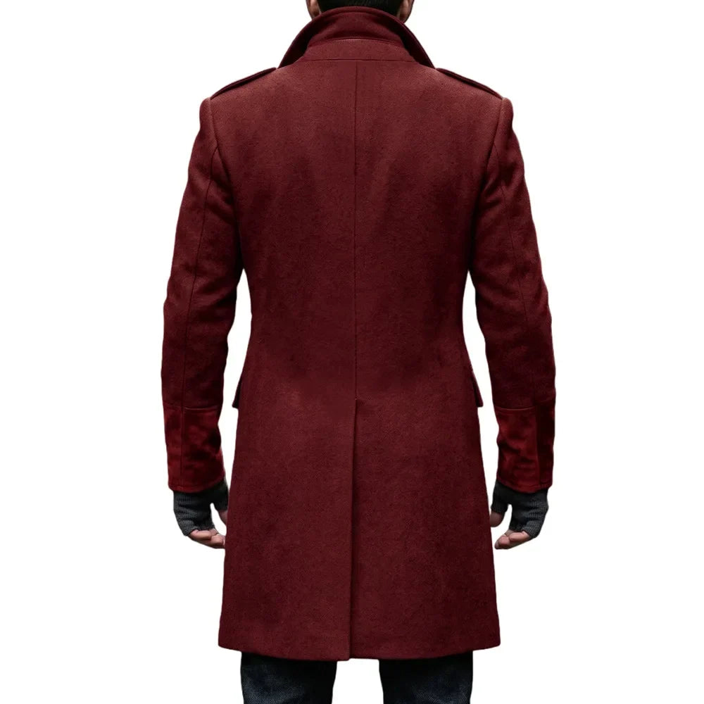 Back view of the burgundy overcoat on a model, with suede-look cuffs and fingerless gloves 18