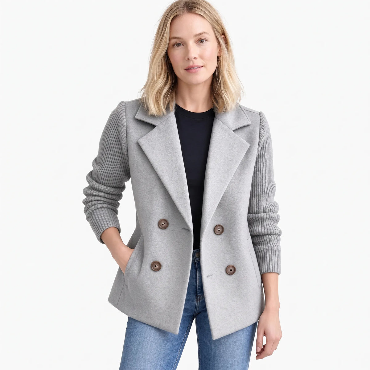 Studio shot of model in light grey double-breasted jacket with ribbed sleeves and wide lapels 19