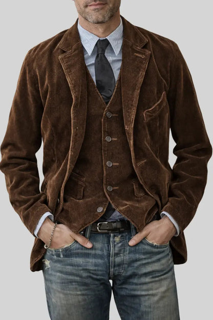 Close crop of brown corduroy jacket and matching waistcoat worn with striped shirt, dark tie and jeans 1