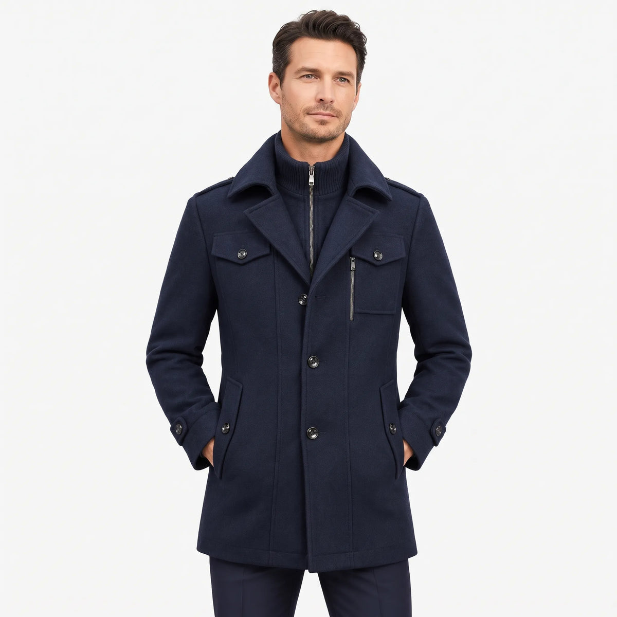 Man wearing the navy overcoat buttoned up, hands in pockets, with ribbed zip-up inner collar 1