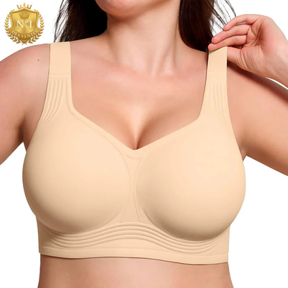 Model wearing the beige V-neck bra from the front, lifting one wide strap with her hand 1