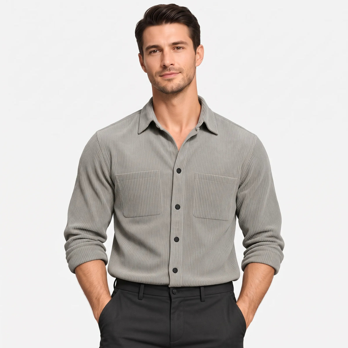 Model in a grey ribbed corduroy-style shirt with two chest pockets, hands in black trouser pockets 1