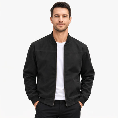 Man in a black suede-look zip jacket with ribbed collar, cuffs and hem, over a white tee 1