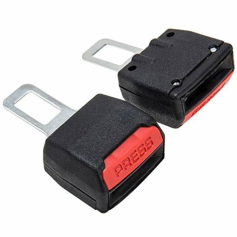 Two black inserts with red release buttons and metal tongues, shown from different angles, one revealing its screwed 6