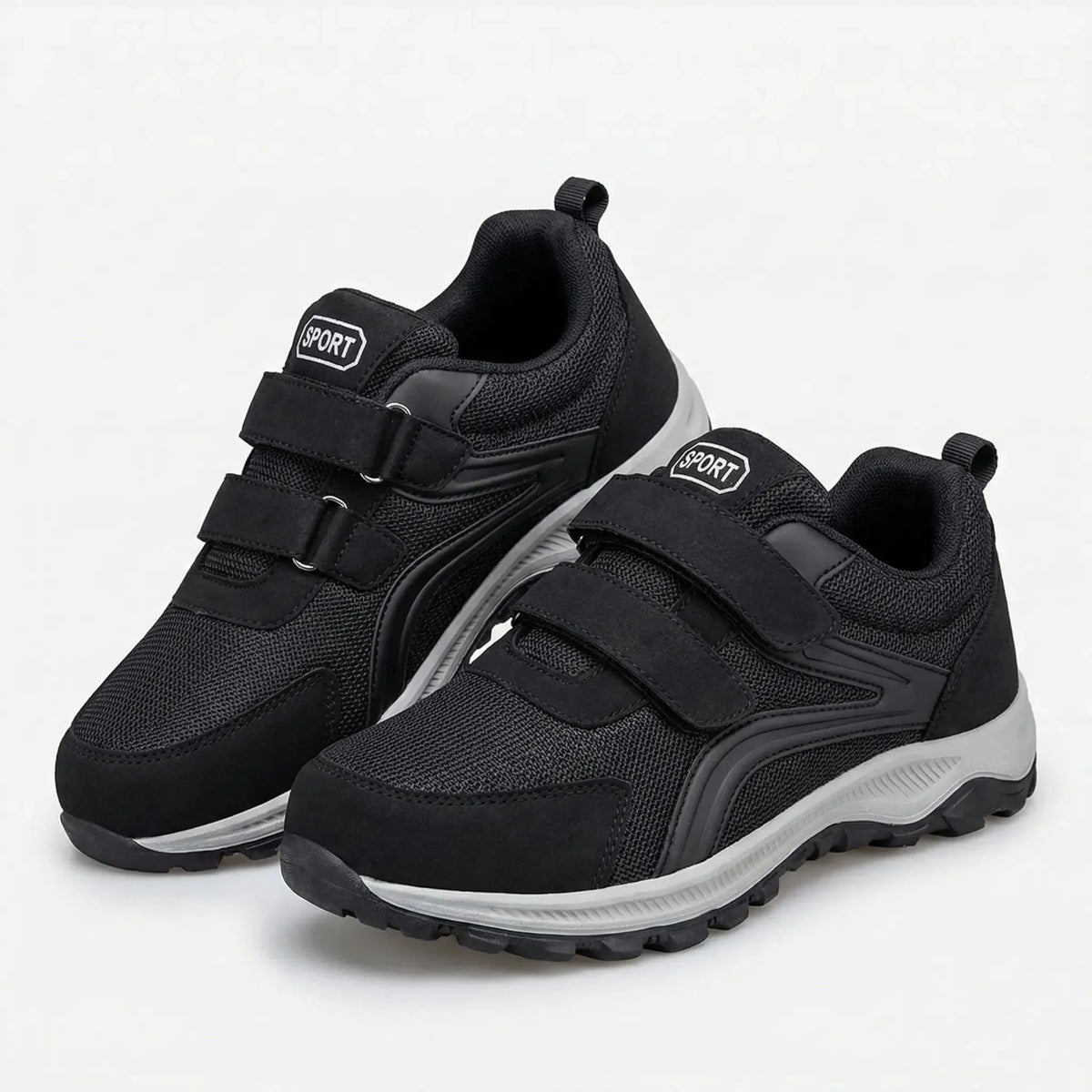 Pair of black shoes with grey soles and double straps, shown at an angle on a white background 5
